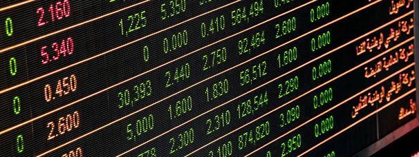 Stocks sink, Dollar jumps after Fed signals slower easing ahead