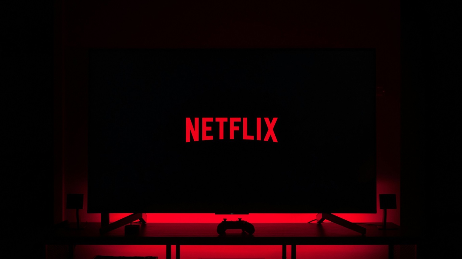 Netflix logo against black background television console